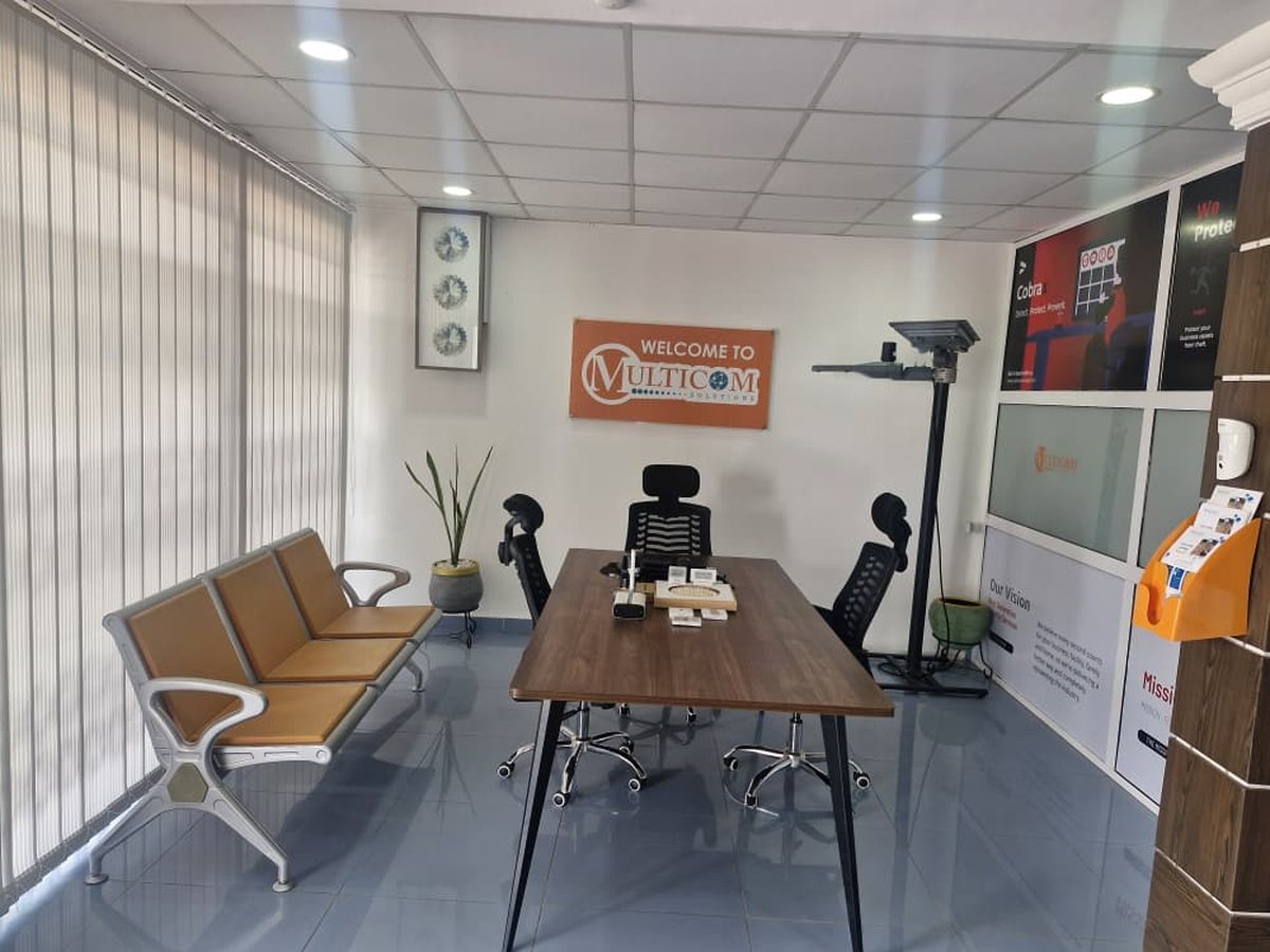 Multicom reception in Accra, with the company mission on the wall