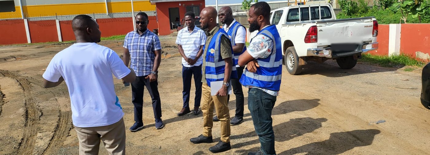 Multicom engineers walking a site with the operator's team
    during a survey